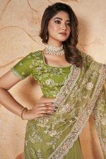 Load image into Gallery viewer, Adorable Sea Green Color Wedding Wear Net Fabric Sequins Work Design Saree
