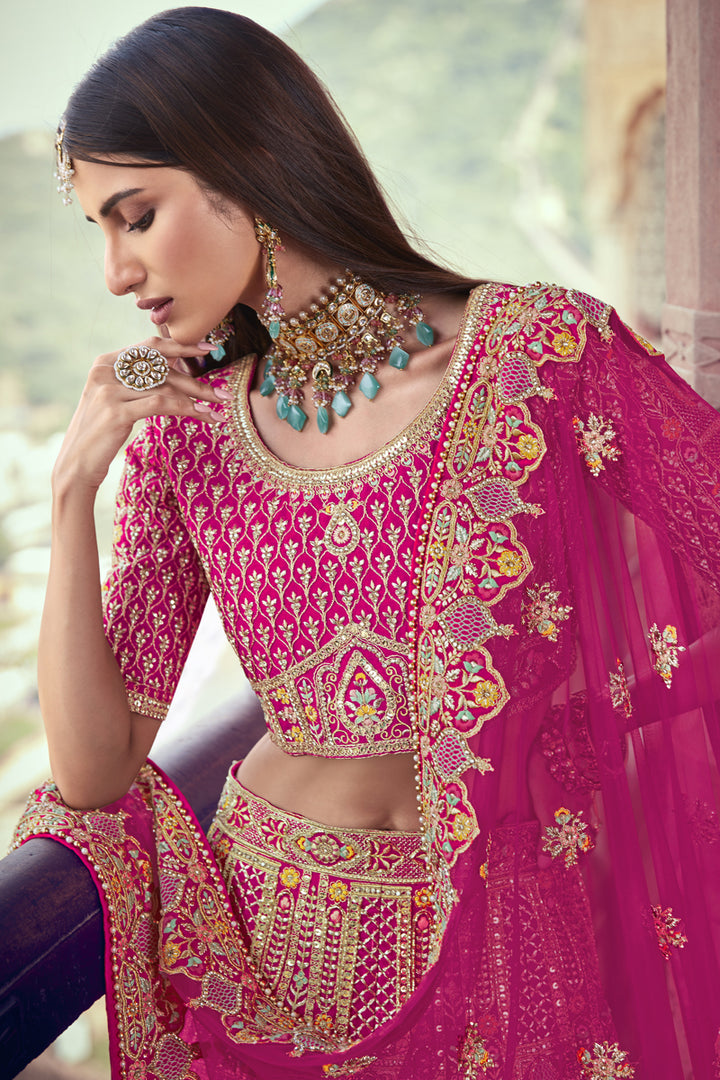 Silk Fabric Magenta Color Embroidered Bridal Lehenga Choli With Double Dupatta
