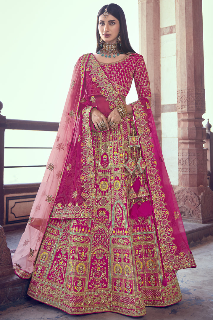 Silk Fabric Magenta Color Embroidered Bridal Lehenga Choli With Double Dupatta