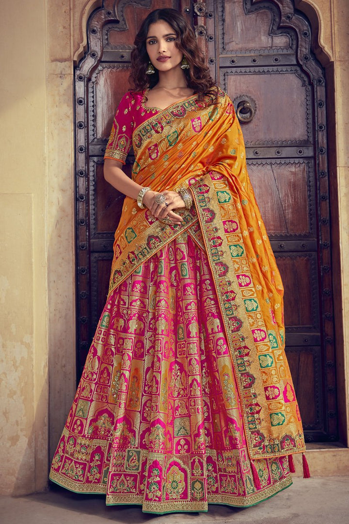 Rani Color Wedding Wear Silk Fabric Embroidered Lehenga Choli