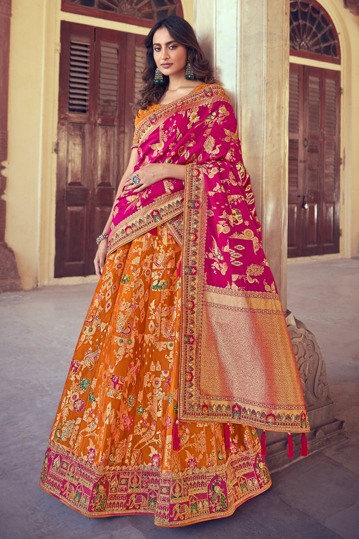 Orange Color Wedding Wear Silk Fabric Embroidered Lehenga