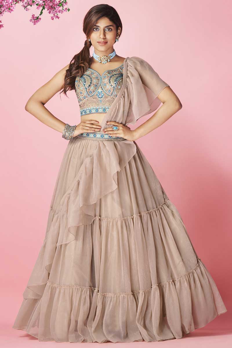 Chiffon Fabric Sangeet Wear Embroidered Work Beguiling Lehenga In Chikoo Color