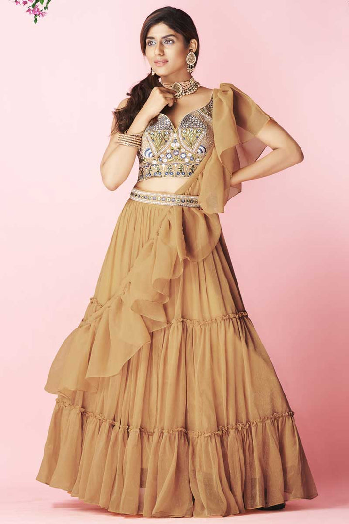 Chiffon Fabric Rust Color Sangeet Wear Riveting Lehenga With Embroidered Work