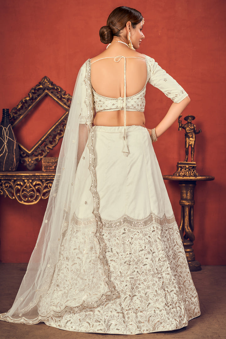 Off White Color Art Silk Fabric Fancy Embroidered Wedding Wear Lehenga Choli