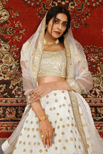 Load image into Gallery viewer, Sangeet Wear Net Fabric Sequins Work Lehenga Choli In White Color
