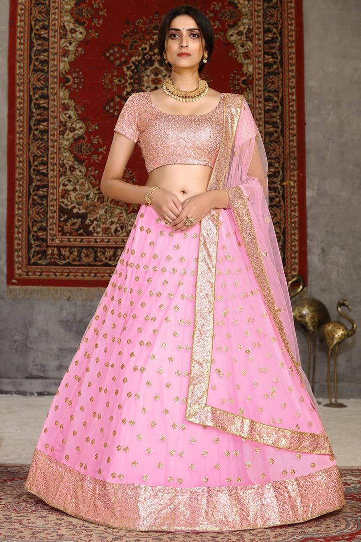 Pink Color Reception Wear Net Fabric Sequins Work Lehenga Choli