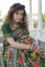 Load image into Gallery viewer, Green Color Sangeet Wear Weaving Work Delicate Patola Style Saree In Art Silk Fabric
