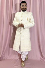 Load image into Gallery viewer, Silk Fabric Designer Heavy Embroidered Wedding Wear Readymade Sherwani For Men In Cream Color
