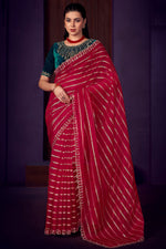 Load image into Gallery viewer, Organza Fabric Stone Work Function Wear Saree In Rani Color
