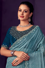 Load image into Gallery viewer, Festive Look Sky Blue Color Organza Fabric Stone Work Saree
