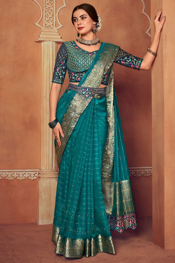 Attractive Border Work Organza Fabric Cyan Color Saree With Embroidered Designer Blouse