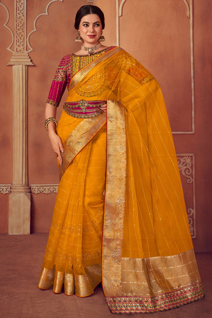 Mustard Color Border Work Organza Saree With Embroidered Designer Blouse