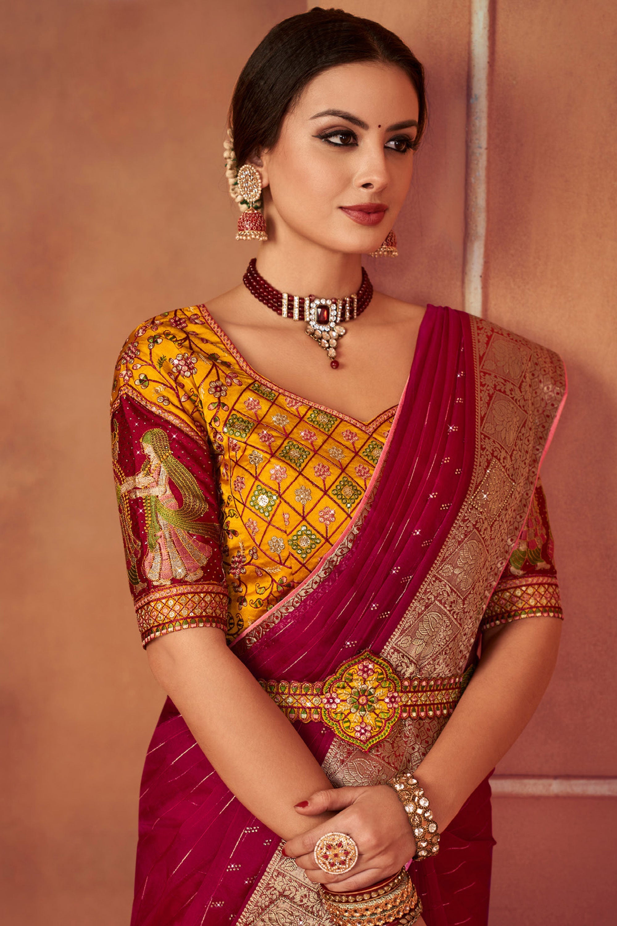 Rani Color Border Work Organza Saree With Embroidered Designer Blouse