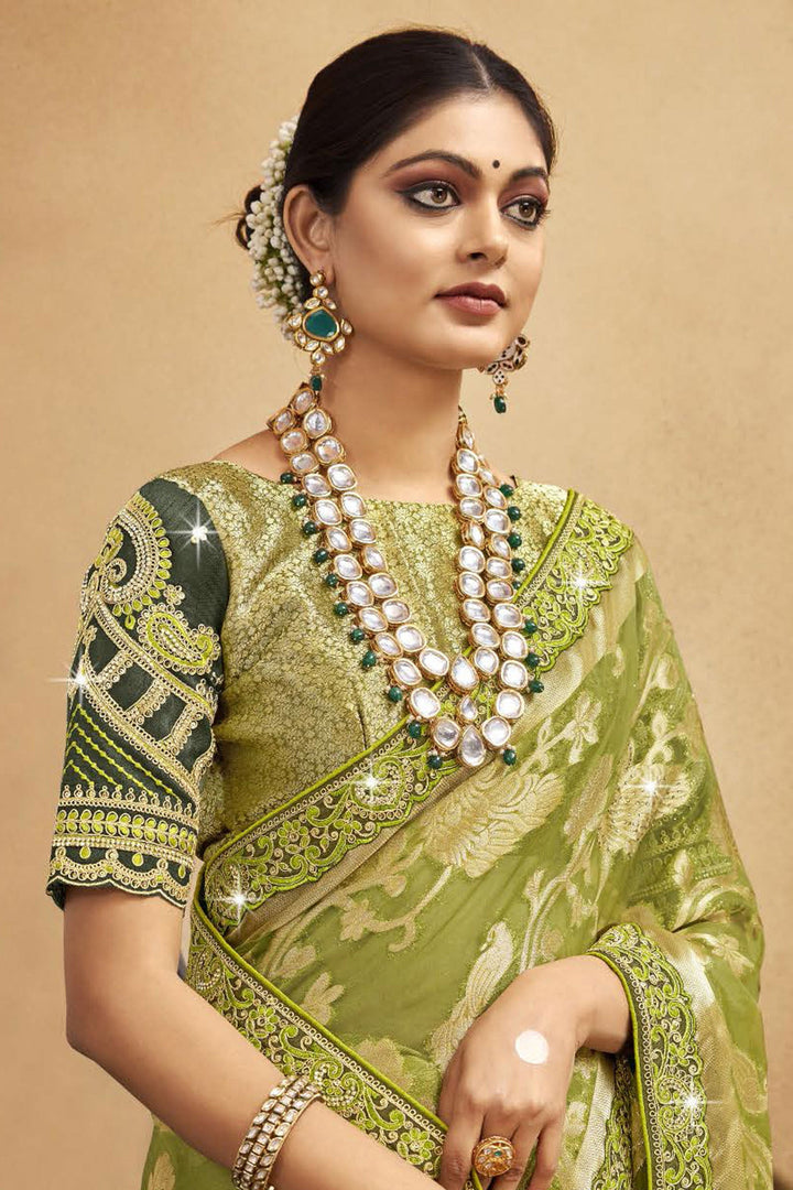 Alluring Weaving Work Organza Fabric Saree In Green Color