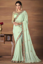 Load image into Gallery viewer, Georgette Fabric Party Wear Sea Green Color Embroidered Work Fantastic Saree
