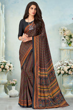 Load image into Gallery viewer, Black Color Crepe Silk Fabric Casual Wear Magnificent Printed Work Uniform Saree
