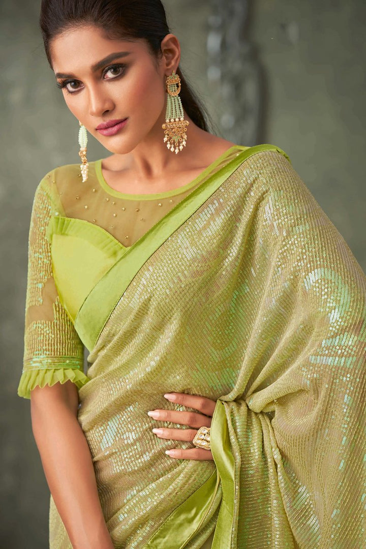Party Wear Georgette Fabric Sequins Work Saree In Green Color