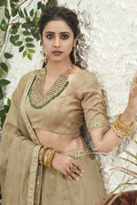 Load image into Gallery viewer, Cream Color Dazzling Organza Fabric Sangeet Wear Lehenga With Sequins Work
