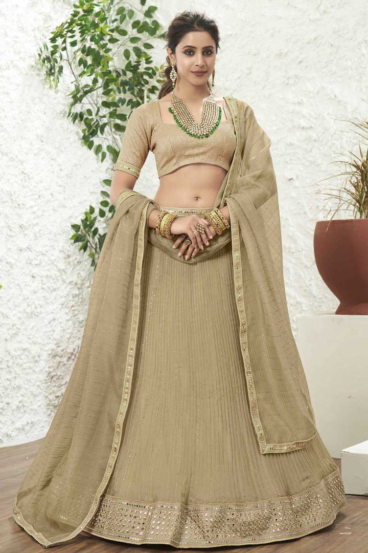 Cream Color Dazzling Organza Fabric Sangeet Wear Lehenga With Sequins Work