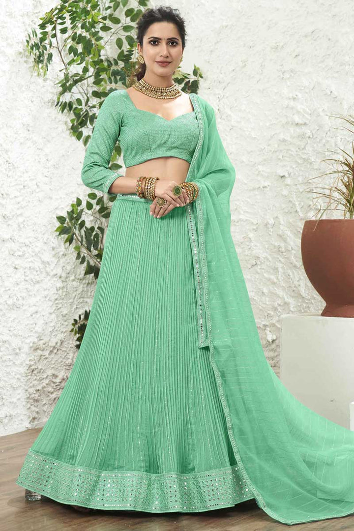 Bright Sea Green Color Organza Fabric Sangeet Wear Lehenga With Sequins Work