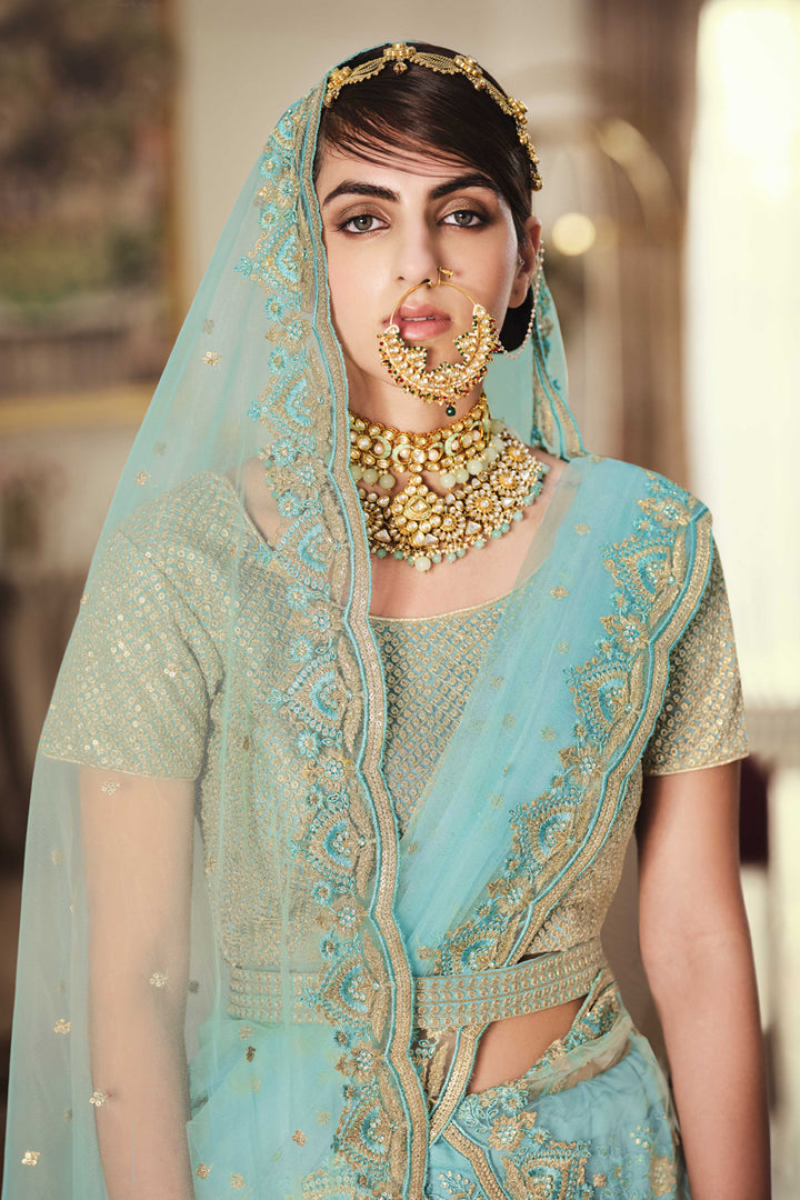 Cyan Color Net Fabric Designer Embroidered Wedding Wear Lehenga Choli