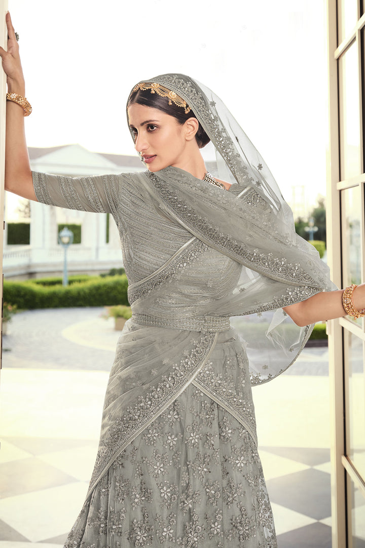 Net Fabric Designer Embroidered Wedding Wear Lehenga Choli In Grey Color