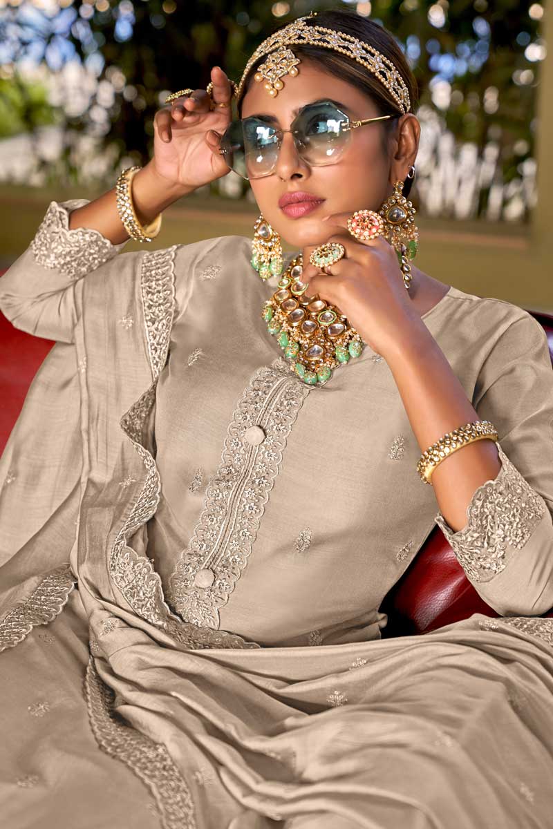 Viscose Fabric Beige Color Festive Wear Riveting Palazzo Suit With Embroidered Work