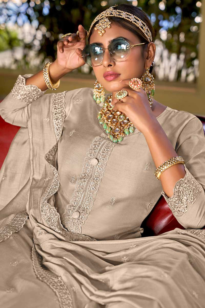 Viscose Fabric Beige Color Festive Wear Riveting Palazzo Suit With Embroidered Work