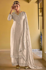 Load image into Gallery viewer, Viscose Fabric Beige Color Festive Wear Riveting Palazzo Suit With Embroidered Work
