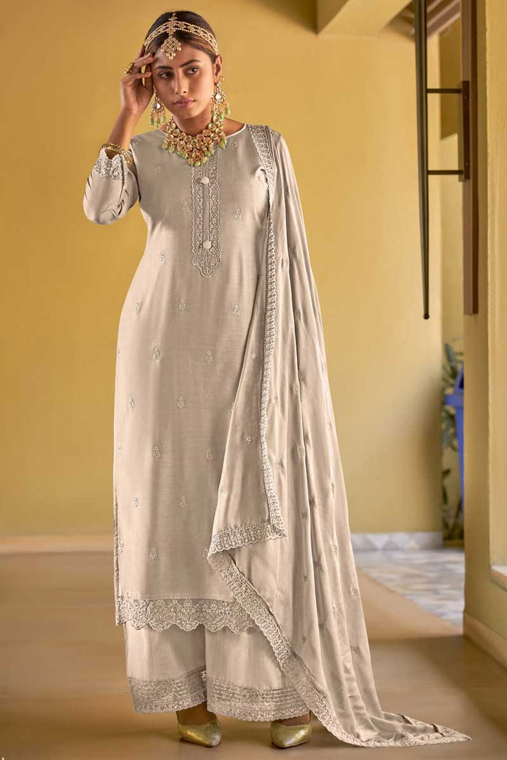 Viscose Fabric Beige Color Festive Wear Riveting Palazzo Suit With Embroidered Work