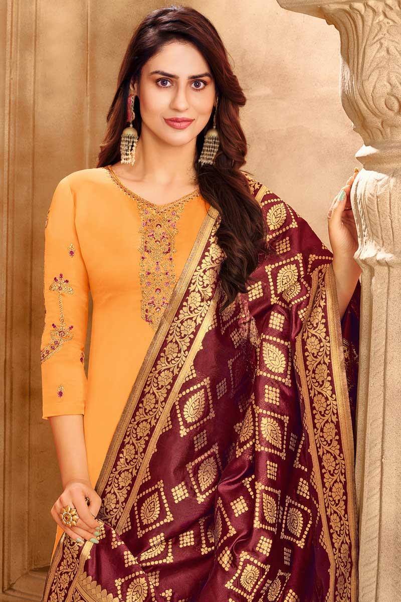 Party Wear Mustard Color Satin Georgette Fabric Pleasance Embroidered Work Salwar Suit With Banarasi Style Dupatta