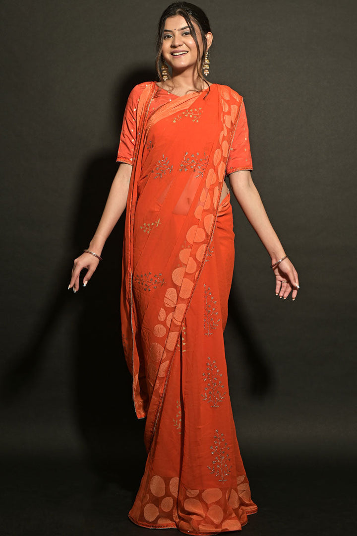 Orange Color Party Wear Brasso Fabric Printed Spectacular Saree