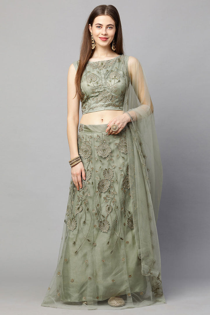 Enchanting Embroidered Sea Green Color Lehenga In Net Fabric