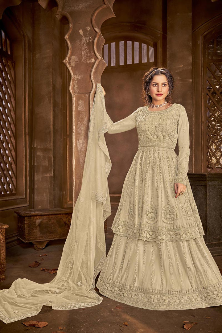 Cream Color Chic Embroidered Festive Wear Sharara Top Lehenga In Net Fabric