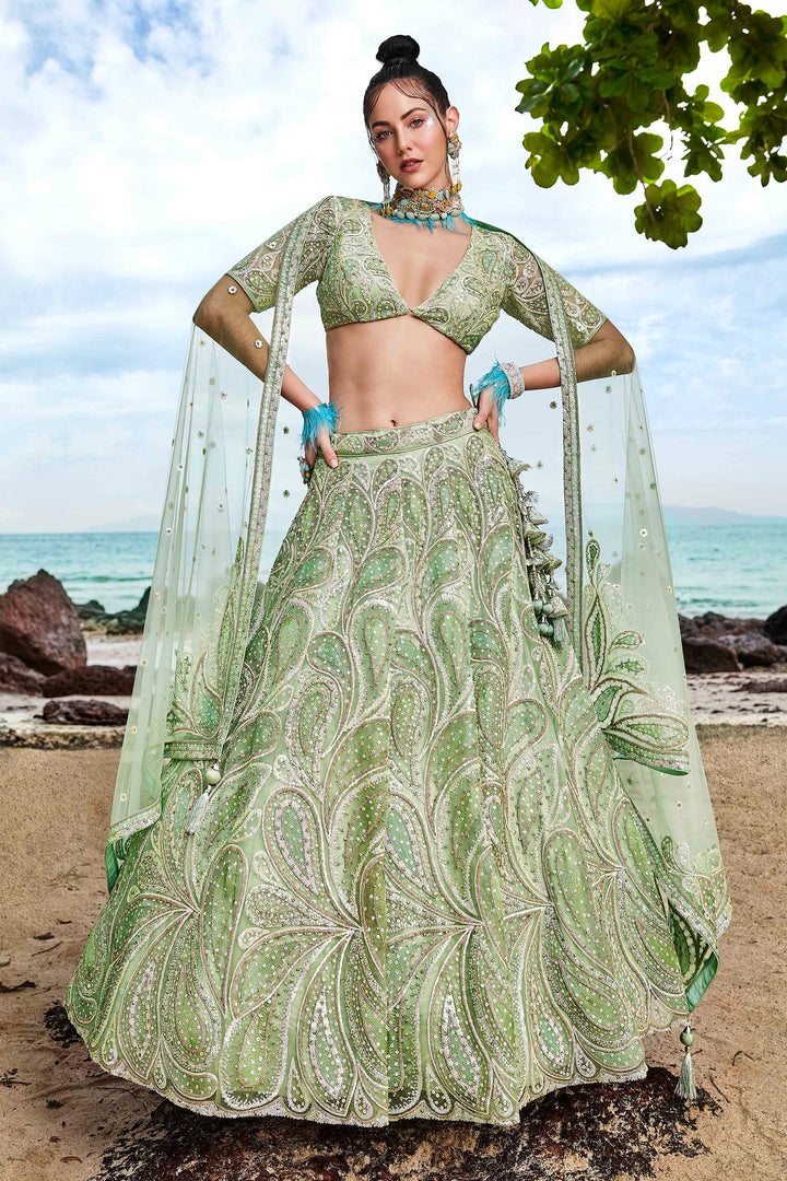 Sea Green Heavy Embroidered Net Fabric Reception Wear Lehenga Choli With Enchanting Blouse