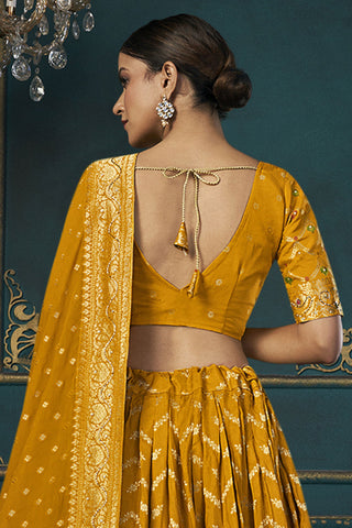 Wedding Wear Art Silk Fabric 3 Piece Lehenga Choli In Mustard Color