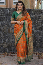 Load image into Gallery viewer, Dola Silk Fabric Printed Patola Saree In Orange Color