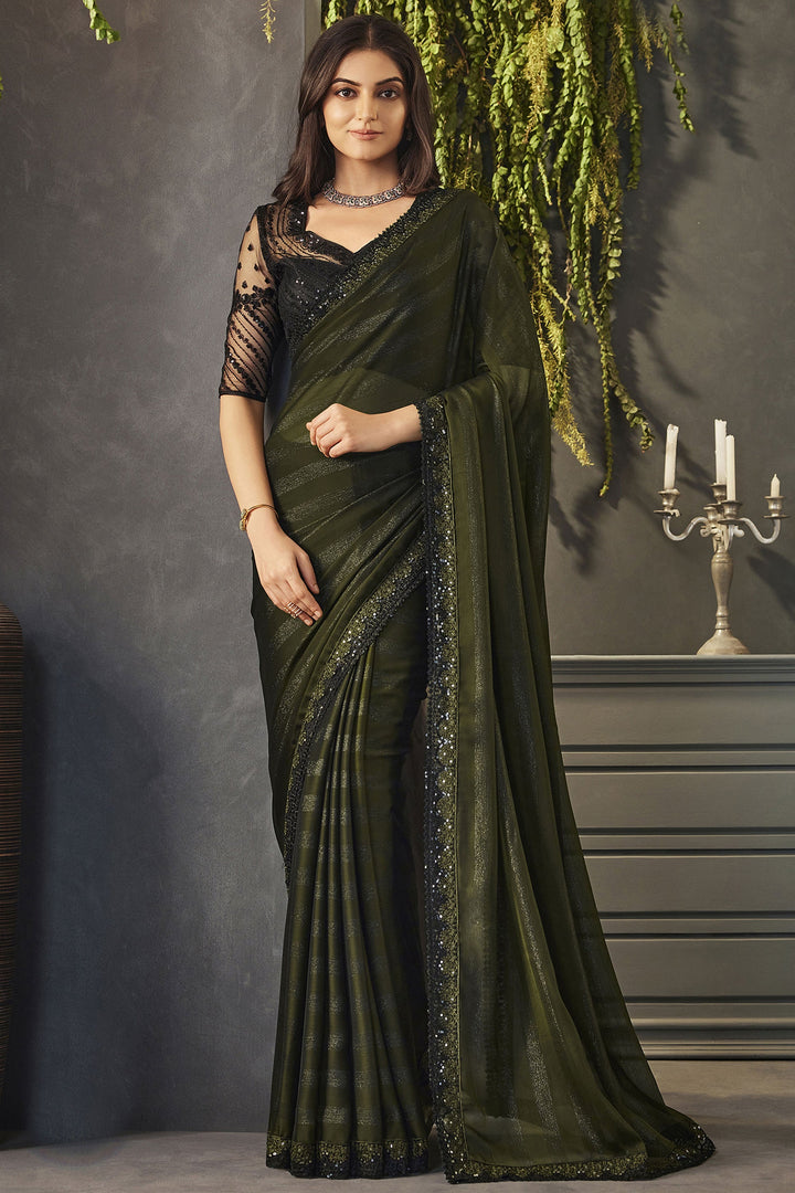 Chiffon Fabric Lace Border Work Glamorous Green Color Saree With Embroidered Blouse