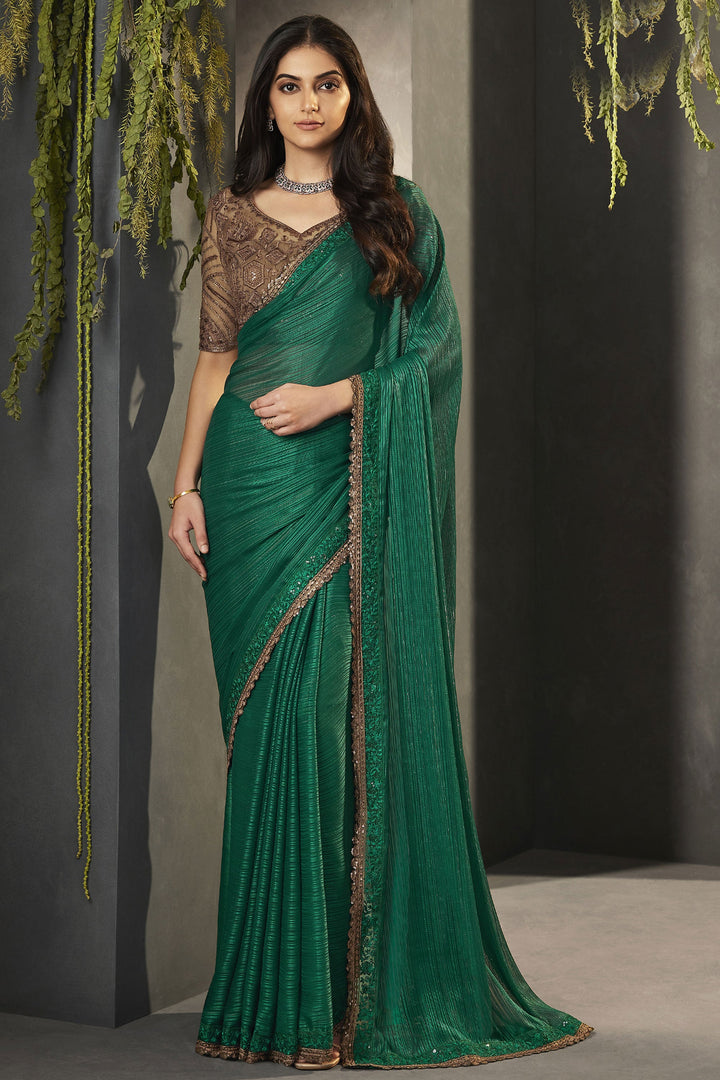Traditional Look Dark Green Color Satin Fabric Lace Border Work Saree With Embroidered Blouse