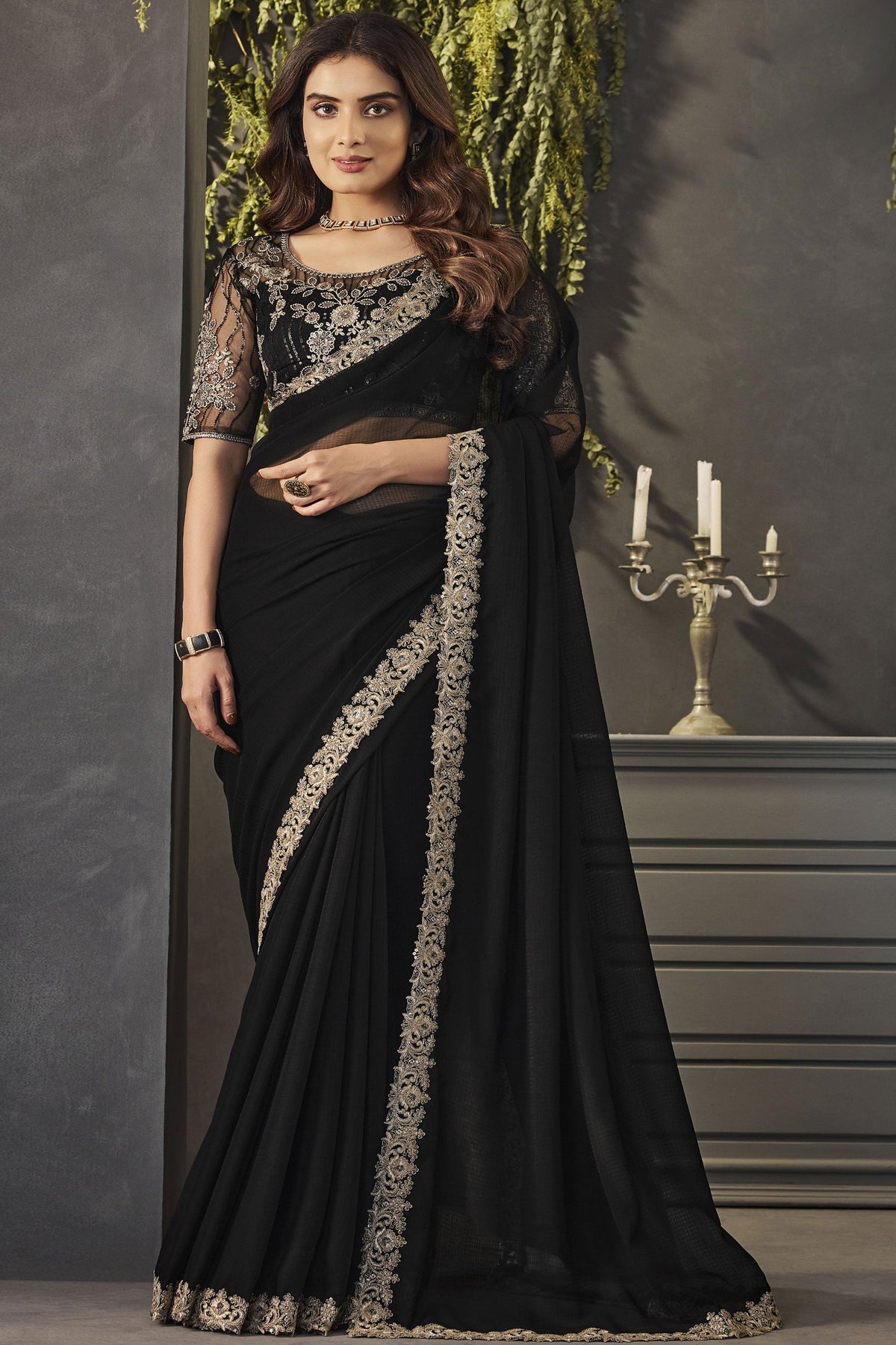 Smashing Black Color Lace Border Work Georgette Fabric Saree With Embroidered Blouse