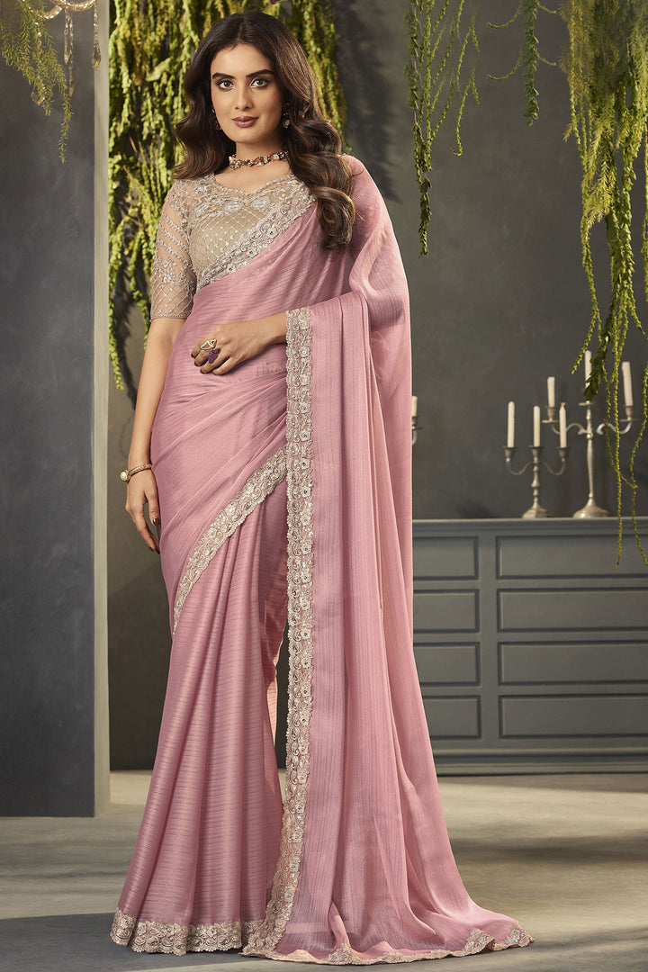 Classy Chiffon Fabric Pink Color Lace Border Work Saree With Embroidered Blouse