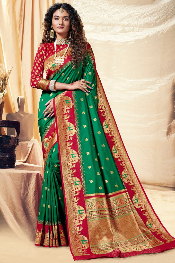 Weaving Work Puja Wear Designer Saree In Green Color Banarasi Silk Fabric