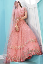 Load image into Gallery viewer, Pink Color Sangeet Wear Designer Embroidered Work Lehenga In Net Fabric
