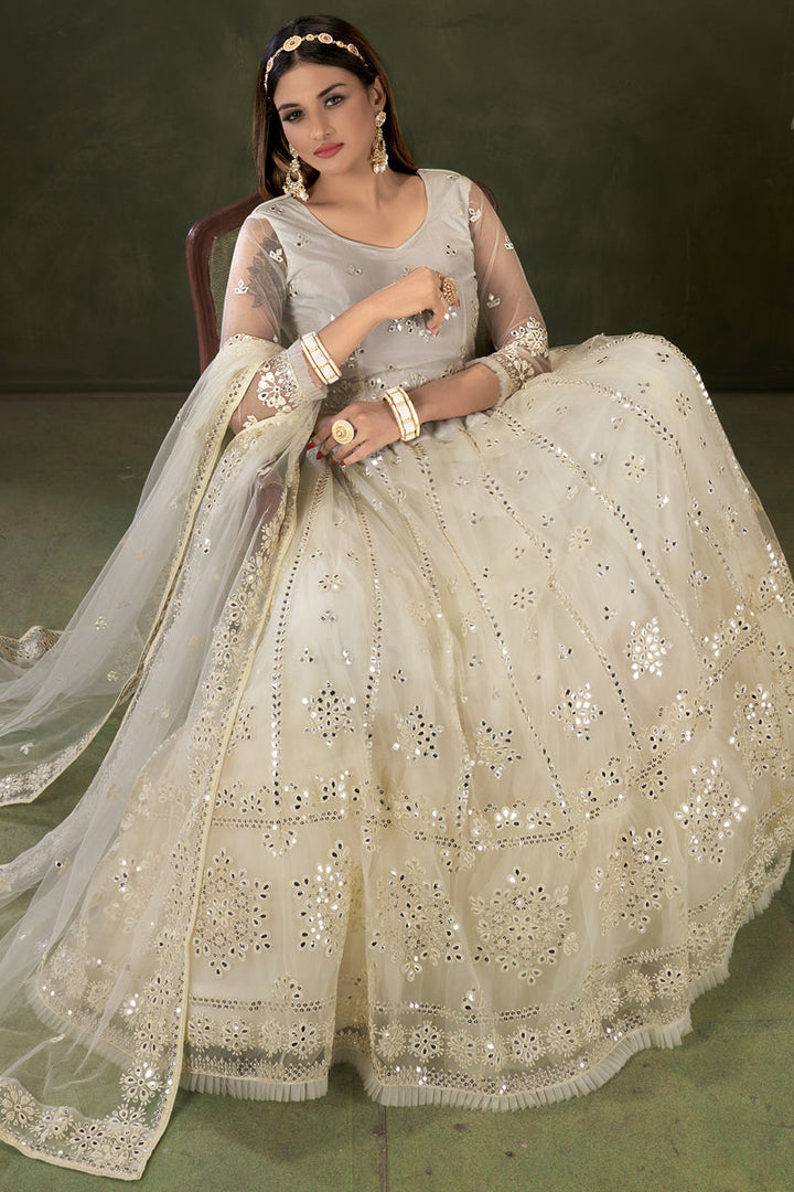 Sangeet Wear Fantastic Embroidered Work Beige Color Designer Lehenga In Net Fabric