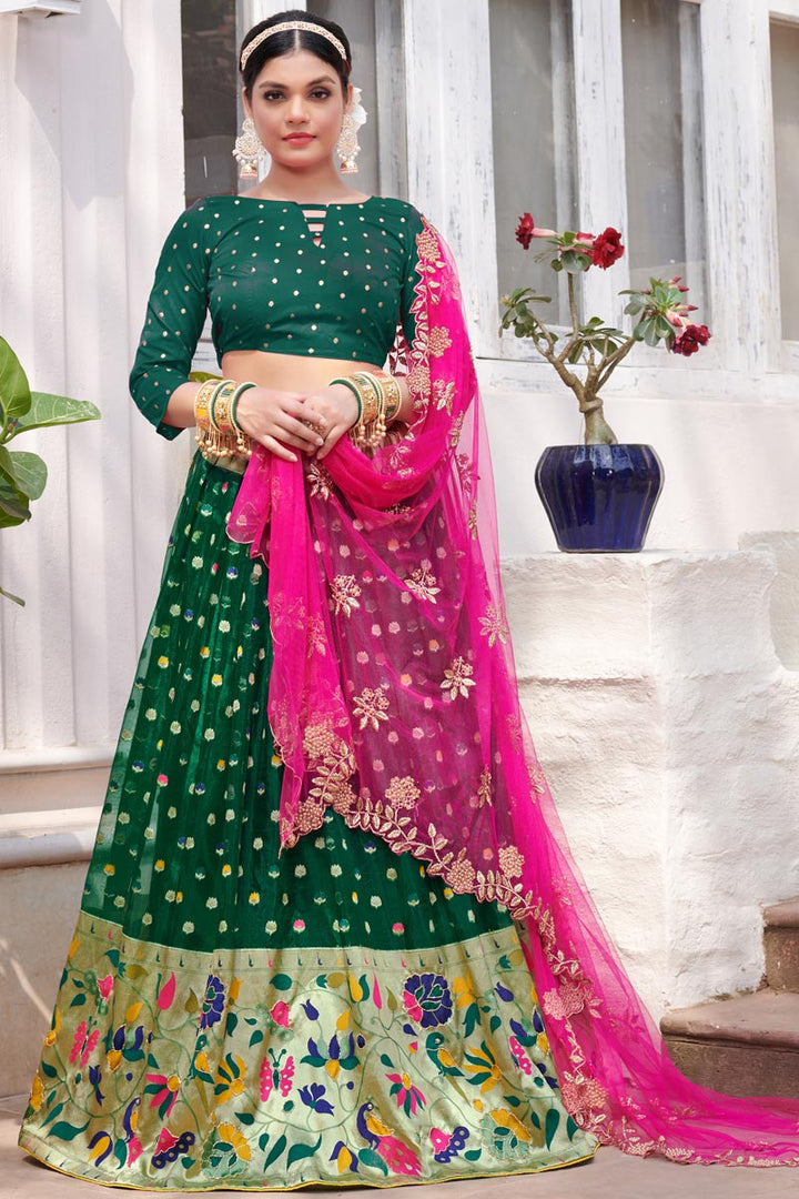 Dark Green Color Charming Organza Fabric Function Wear Lehenga With Weaving Work
