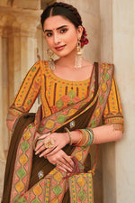 Load image into Gallery viewer, Embroidered Designs On Brown Color Crepe Fabric Mesmeric Saree
