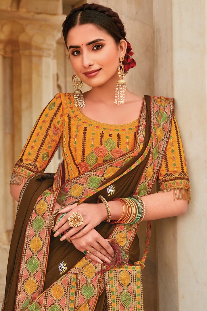 Embroidered Designs On Brown Color Crepe Fabric Mesmeric Saree