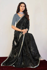 Load image into Gallery viewer, Tempting Black Color Brasso Fabric Embroidered And Stone Work Saree
