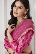 Load image into Gallery viewer, Engaging Rani Color Organza and Net Fabric Saree With Embroidered Work
