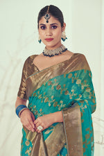 Load image into Gallery viewer, Organza Fabric Cyan Color Alluring Weaving And Stone Work Saree
